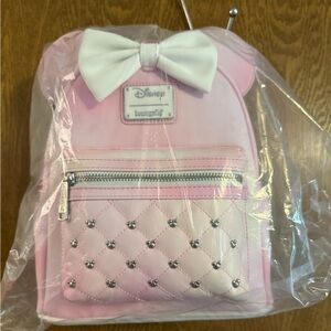 Loungefly Pink and White Glow-in-the-Dark Backpack